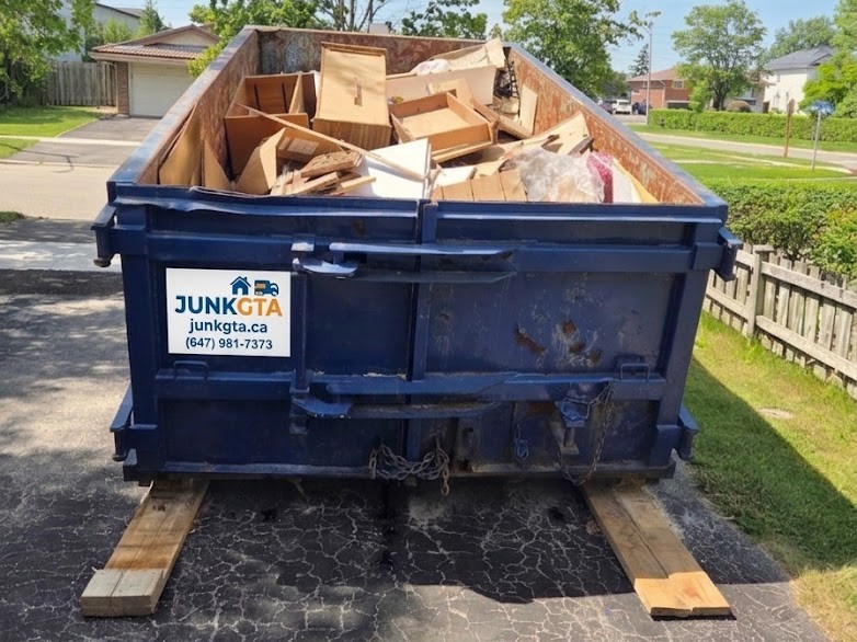 Dumpster bin delivered safely to a driveway in the GTA & Surrounding Areas by JunkGTA